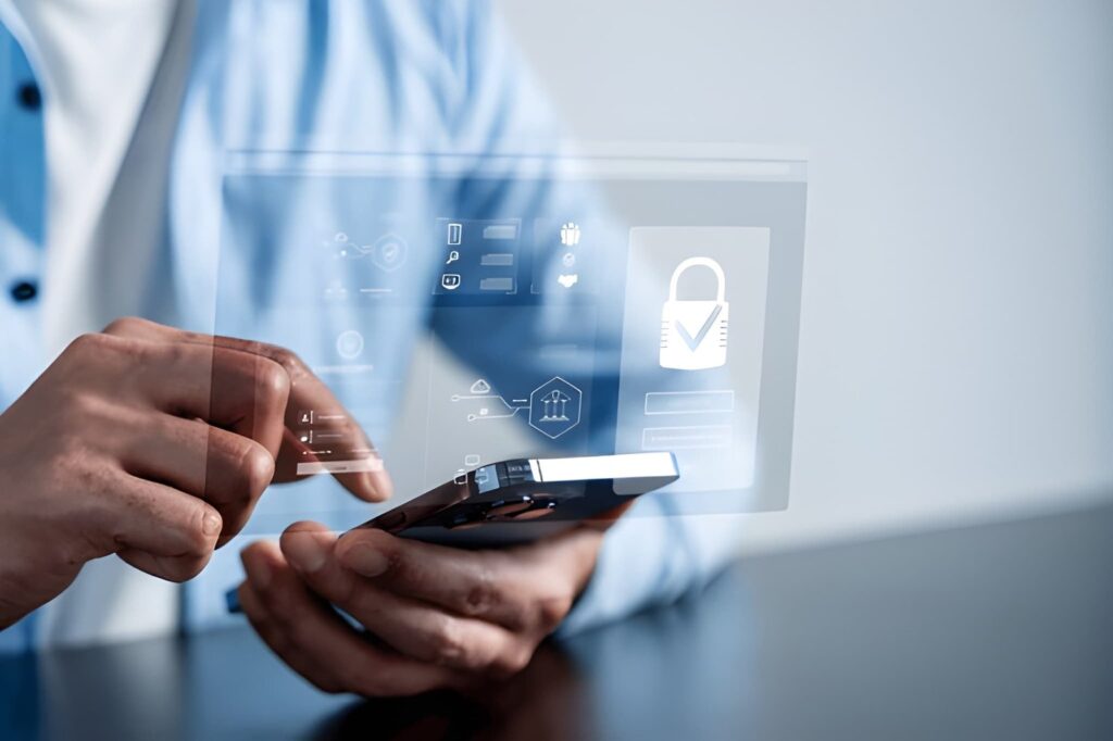 Person using smartphone with digital security interface showing padlock verification icon, representing web application security best practices